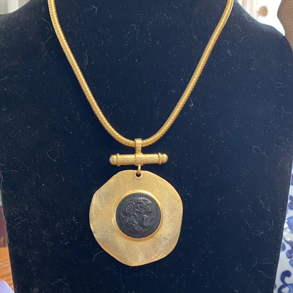 Gold Medallion Pendant Necklace with Black Cameo Center
